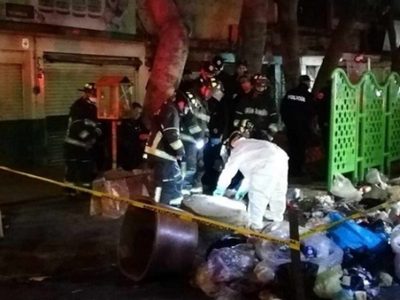 Hallan un cadáver en una tina con cemento en calles de La Merced