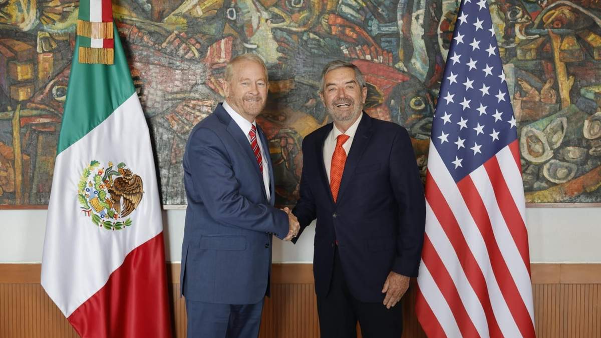 Ron Johnson con Juan Ramón de la Fuente