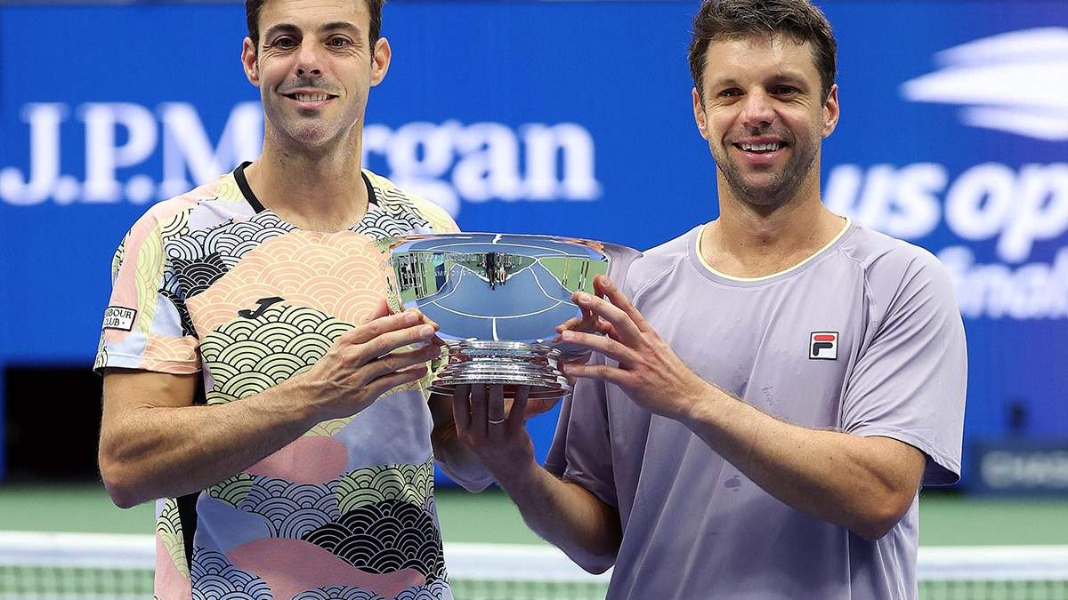 Horacio Zeballos, junto al español Marcel Granollers.