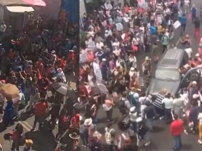 Captan en VIDEO a conductor que intenta atravesar manifestación en CDMX
