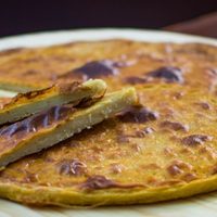 Fainá gratinada con mozzarella y espinaca: una delicia sin igual para los fanáticos de este clásico