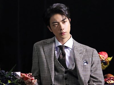 Jin de BTS asistió a la boda de su hermano y creó una controversia por estas fotos