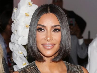 La foto de Kim Kardashian "al estilo de Eva": en el paraíso y comiendo una extraña fruta