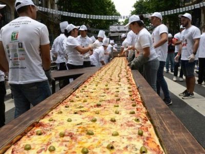 Conmemoran con festejos dos récords Guinness en empanadas y pizzas