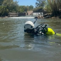 El equipo de buceo busca a Rita en el canal Cacique Guaymallén