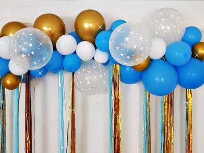 Con un globo, servilletas y palitos de madera, hacé un móvil para el cuarto de tu hijo, digno de una revista de decoración