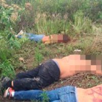 Dejan narcomensaje en espaldas de tres ejecutados en Puebla