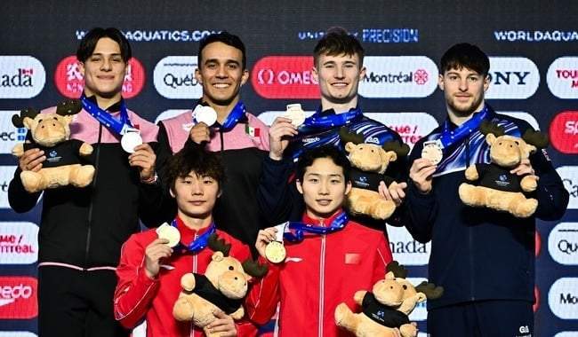 Osmar Olvera y Juan Celaya ganan medalla de plata en la Copa del Mundo de Clavados Montreal 2026.